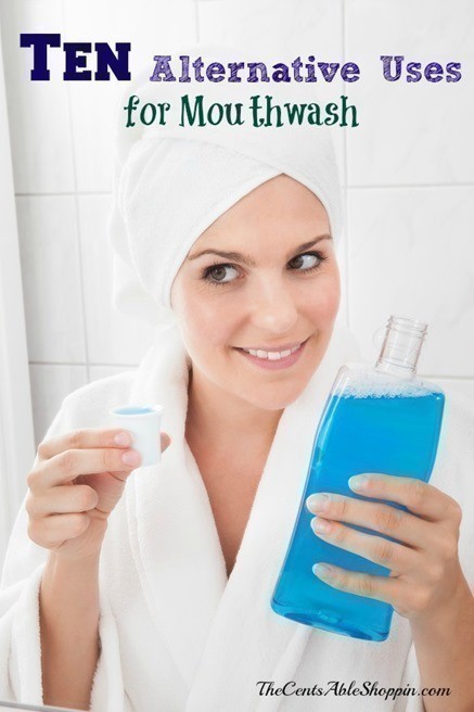 Woman Holding Bottle Of Mouthwash