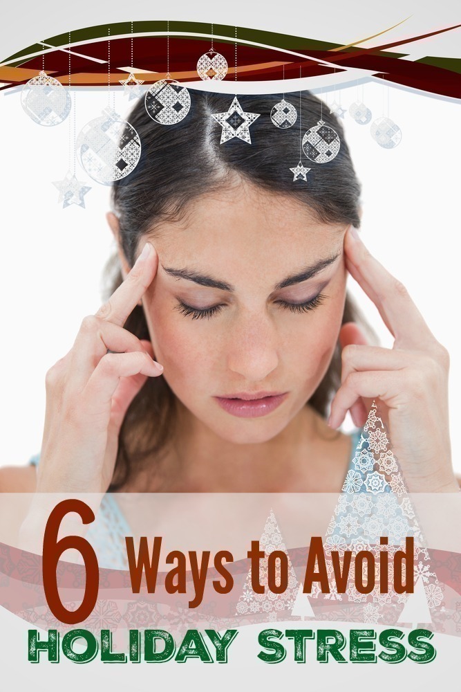 Portrait of a young woman having a headache against christmas frame