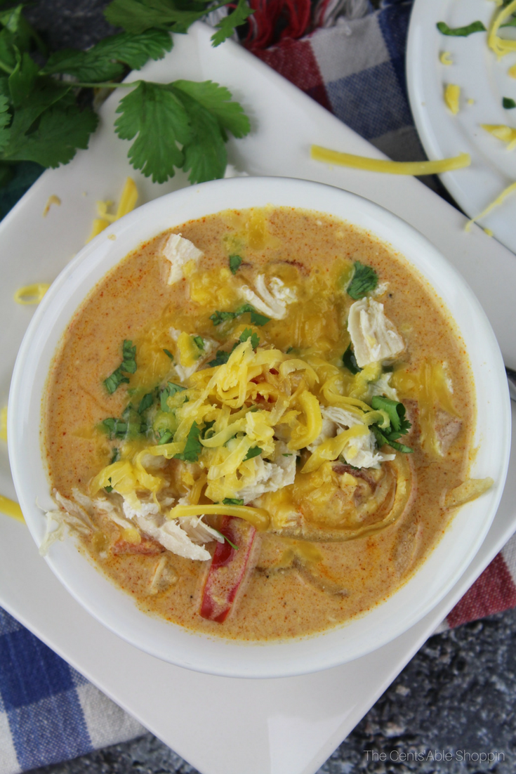 This Instant Pot Cheesy Chicken Enchilada Soup is a quick and easy recipe for a deliciously cheesy and hearty soup that everyone will love.