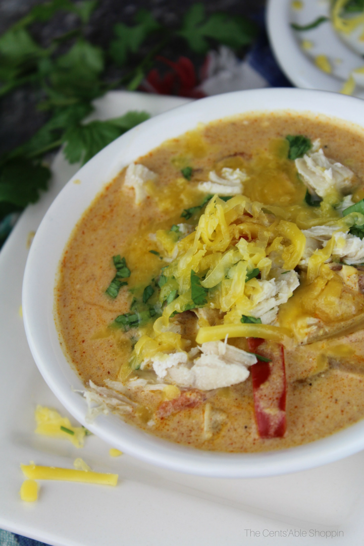 This Instant Pot Cheesy Chicken Enchilada Soup is a quick and easy recipe for a deliciously cheesy and hearty soup that everyone will love.