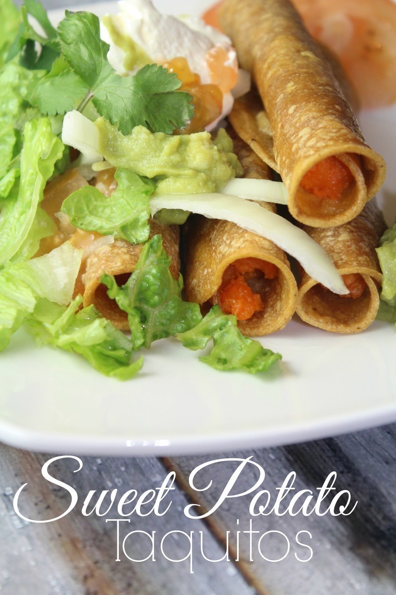 Baked sweet potato taquitos that are delicious when topped with shredded lettuce, tomatoes, sour cream and guacamole. #meatless #sweetpotato #mexican