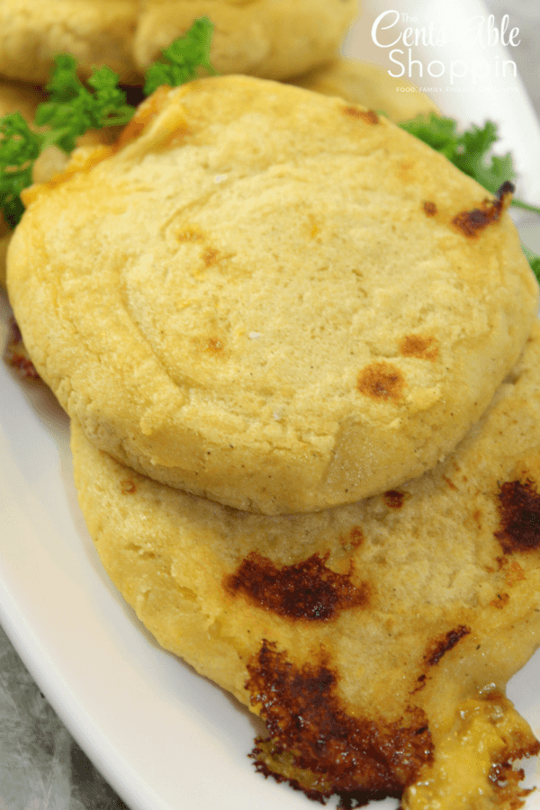 A pupusa is a traditional Salvadoran dish made of a thick, handmade corn tortilla, stuffed with cheese, and/or beans and cheese.