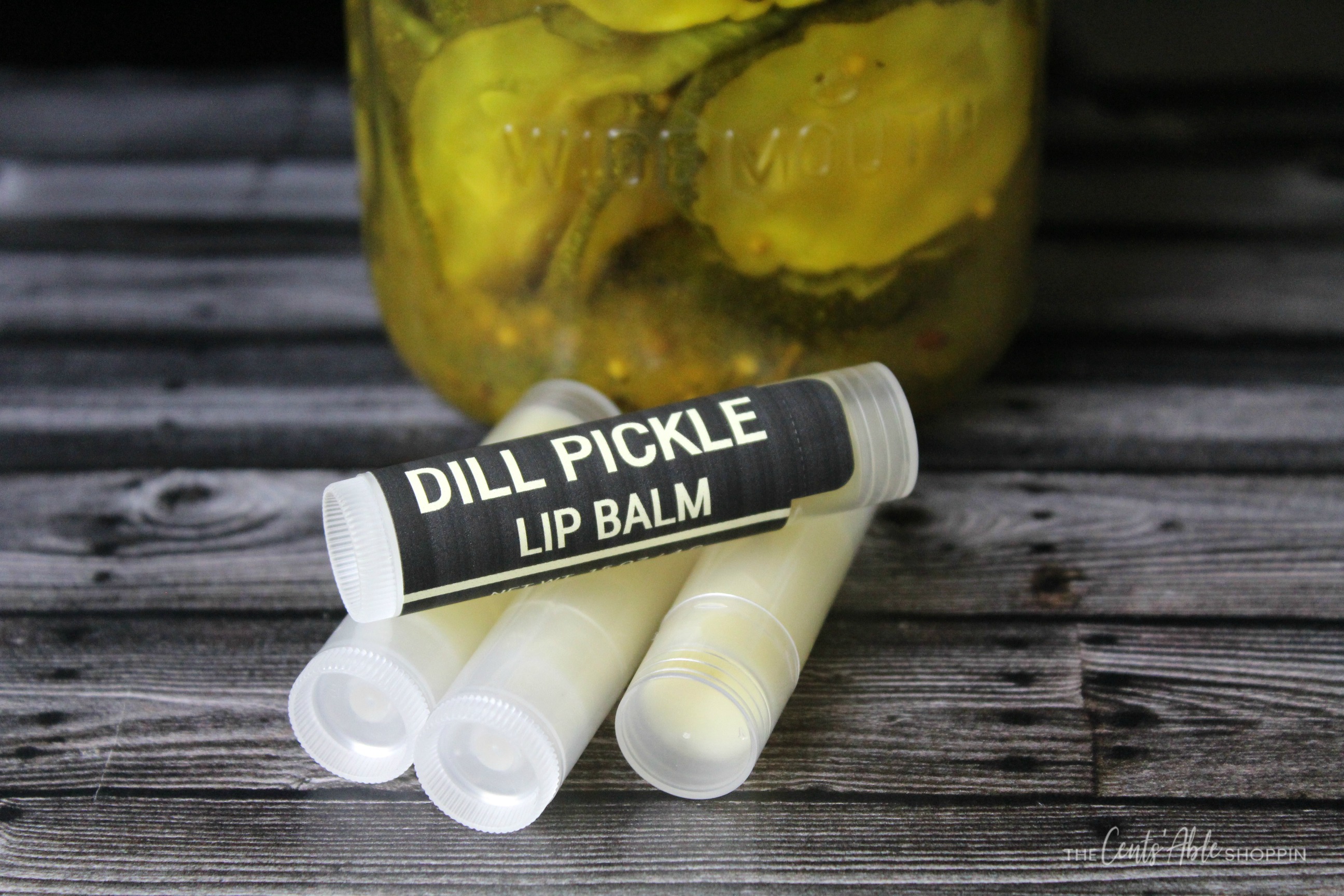 This Dill Pickle Lip Balm is easy to throw together with simple ingredients that come together to make the ideal gift for anyone crazy about dill pickles! #dillpickles #lipbalm #essentialoils #pickles