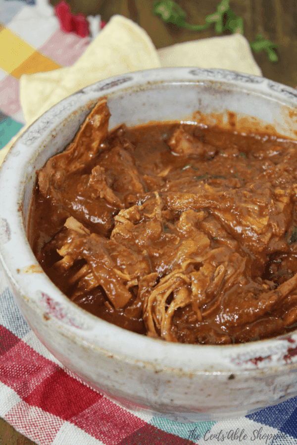 Whip up this rich and savory Instant Pot Mole sauce with ingredients from your kitchen pantry. Serve it with chicken or turkey and rice for a complete meal.