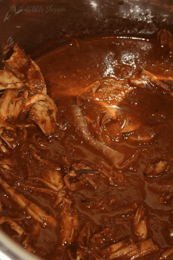 Whip up this rich and savory Instant Pot Mole sauce with ingredients from your kitchen pantry. Serve it with chicken or turkey and rice for a complete meal.