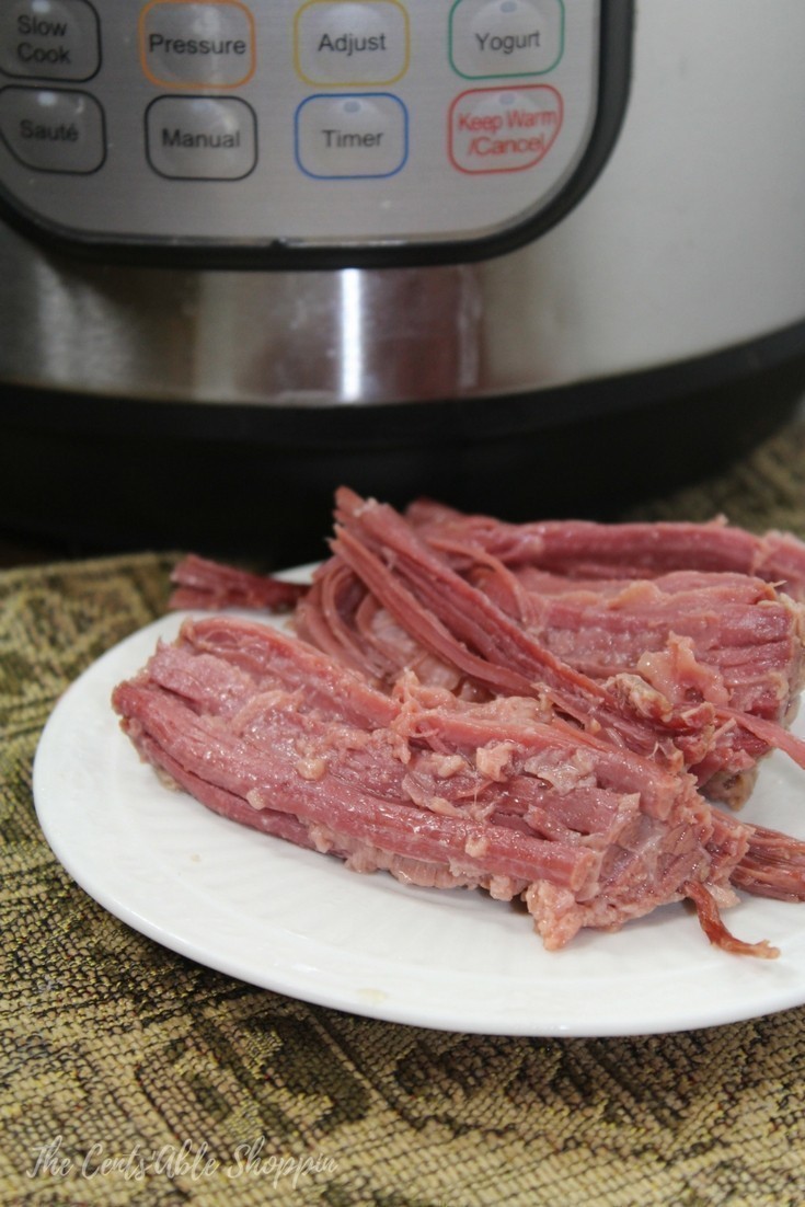 Traditional Corned Beef cooks up with just a few simple ingredients in the Instant Pot to make the most tender, juicy brisket! #cornedbeef #InstantPot #brisket #PressureCooker #StPatricksDay #Irish