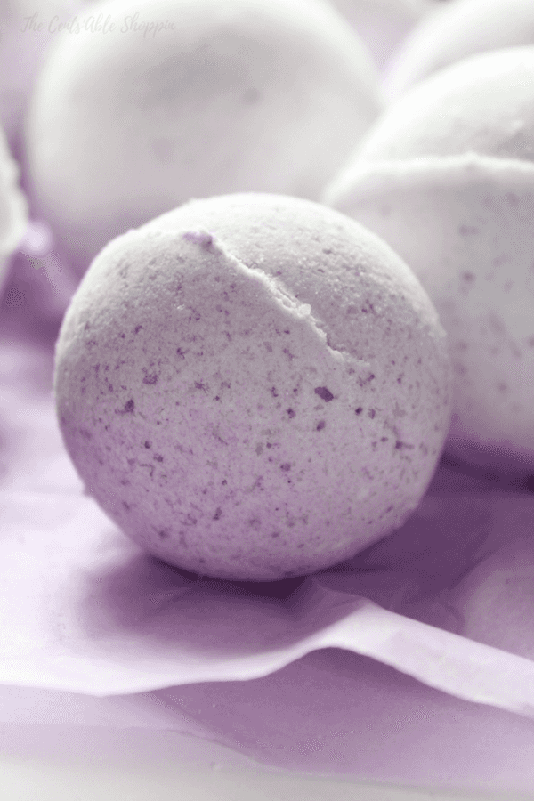 These DIY Bath Bombs are incredibly easy to make - personalize with your own scent and color and give as gifts for Mother's Day, Valentine's Day, birthdays and more.