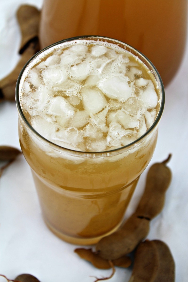 Agua de Tamarindo or, Tamarind Water, is one of the most popular aguas frescas in all of Mexico. Learn how to make Agua de Tamarindo easily at home.
