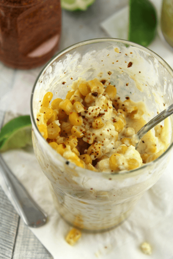 Esquites is a an off the cob version of elotes - grilled Mexican Sweet Corn smothered in creamy, chile lime sauce and served in a cup.