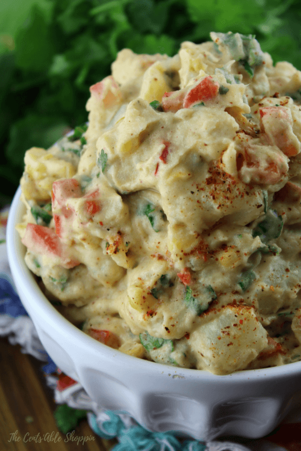 A delicious combination of Mexican spices, mayonnaise and fresh veggies coat potatoes for a twist on traditional potato salad.