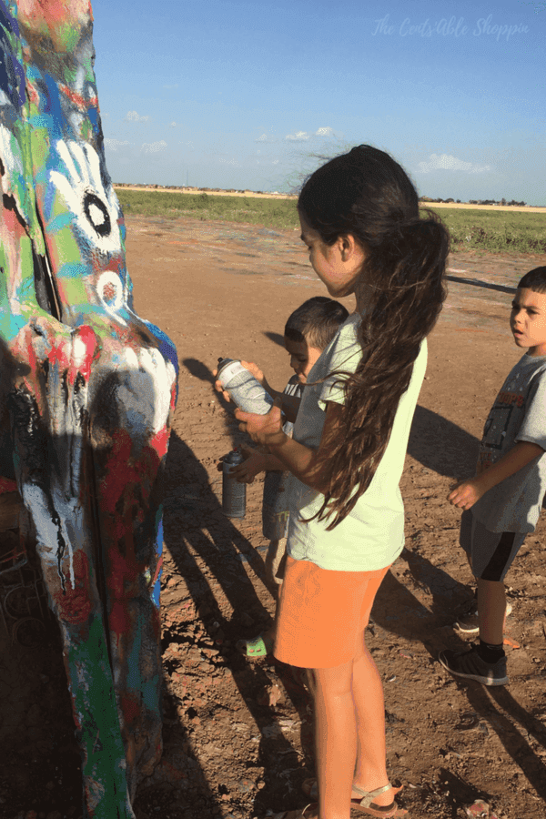 One cannot possibly pass through Amarillo, Texas without stopping at Cadillac Ranch. It's a [FREE] must-see attraction for both young and old - you'll want to read these 7 tips before visiting!