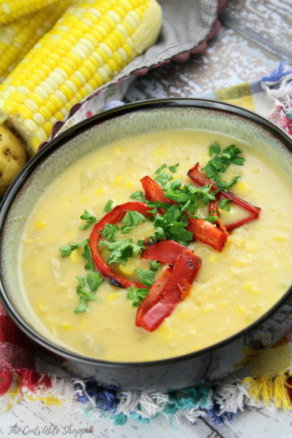 This rich and creamy corn chowder is filled with warm spices like paprika and cayenne pepper, combined with potatoes and topped with roasted peppers. It's the perfect soup for summer!