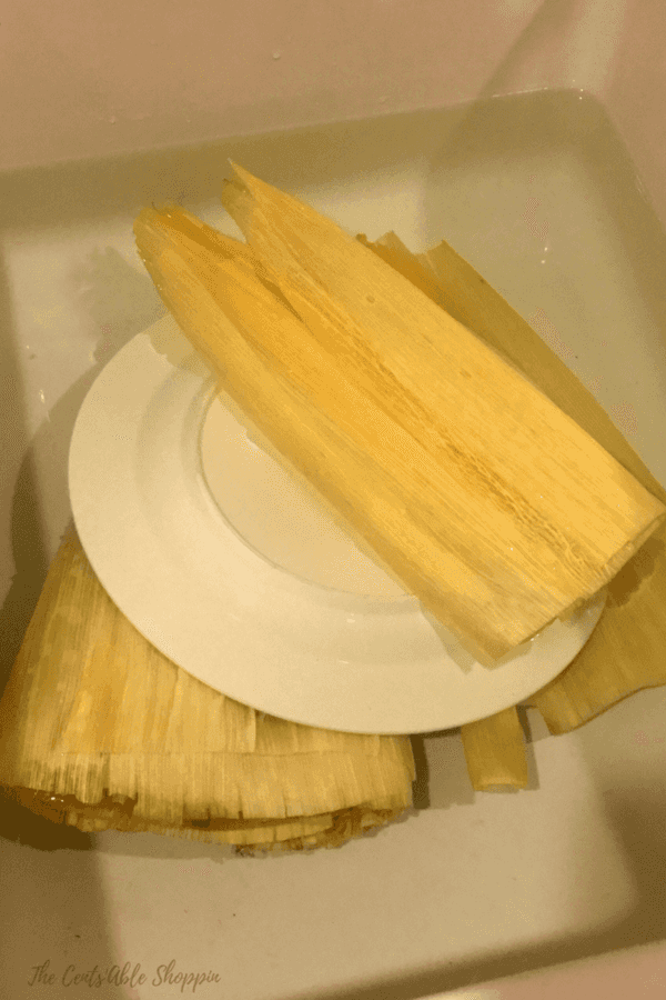 A change from traditional Mexican tamales, sweet tamales with cajeta combine brown sugar, cinnamon, and almonds or walnuts cooked in the Instant Pot and drizzled with cajeta and sprinkled with additional almonds.