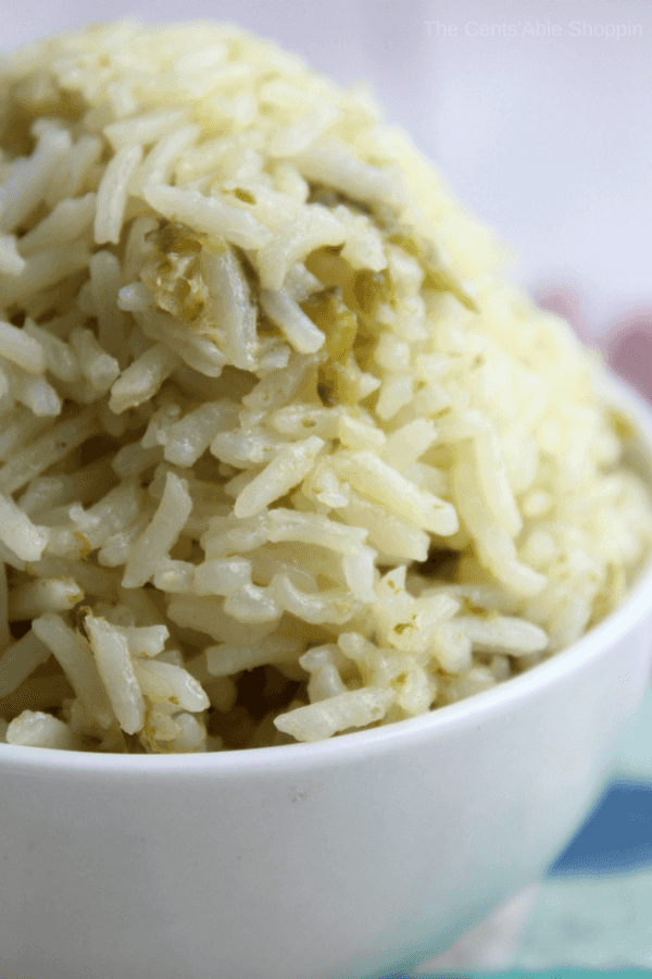 Kick traditional white rice up a notch with the addition of green chiles and minced garlic in a flavorful chicken broth.  #InstantPot #HatchChiles #rice #PressureCooker #rice