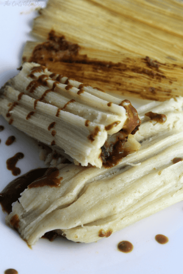 Beautifully mashed potatoes smothered in a rich, fragrant mole sauce come together to make these meatless tamales with potato and mole that are Vegan friendly!