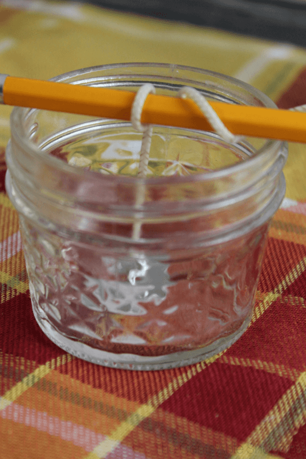 Celebrate fall by making an easy Cinnamon Orange fall candle - it smells incredible and is so easy to put together!