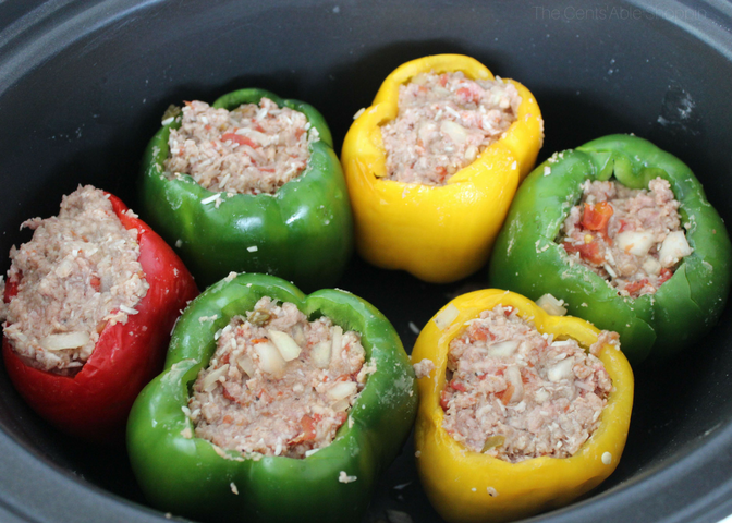 These crock pot stuffed peppers are an easy, healthy, and delicious way to cook without having to slave away in the kitchen. Throw them in the crock pot and they'll be ready when you get home from a busy day at work! #peppers #easy #healthy