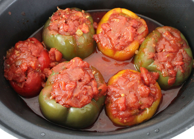 These crock pot stuffed peppers are an easy, healthy, and delicious way to cook without having to slave away in the kitchen. Throw them in the crock pot and they'll be ready when you get home from a busy day at work! #peppers #easy #healthy