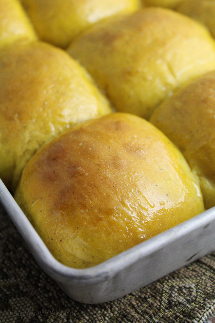 These pumpkin dinner rolls are light, fluffy, and perfect to serve along your next bowl or soup or Thanksgiving dinner with your family!