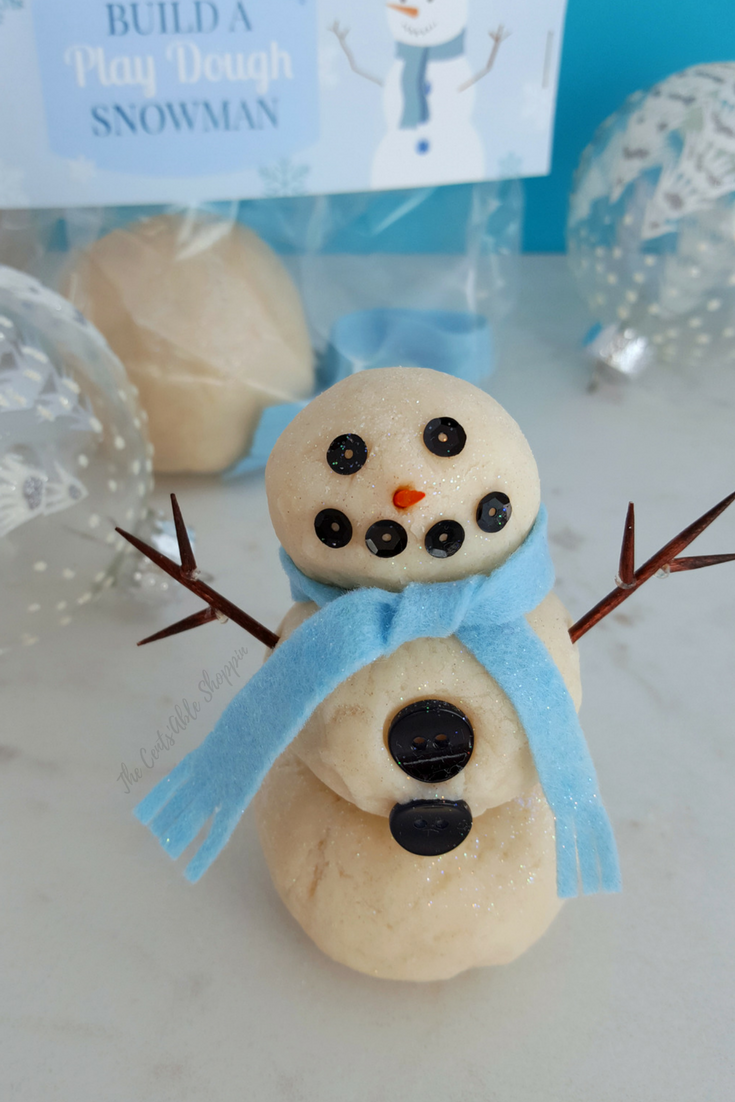 This Build a Snowman Play-Dough Kit is the perfect activity for kids and includes an easy sparkly play-dough recipe, label and decor ideas!