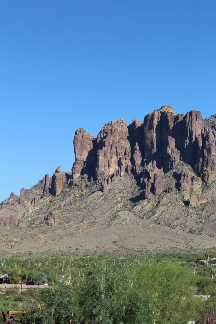 Goldfield Ghost Town is an authentic, reconstructed ghost town in Apache Junction, Arizona - right at the base of the Superstition Mountains east of Phoenix. The town features gold mine tours, gold panning, gunfights, a zipline and more.