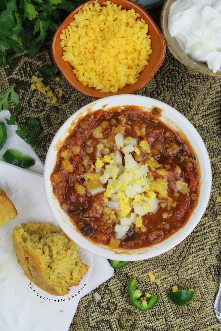 This hearty, 15-bean Instant Pot Chili is perfect to make for a family or a crowd. Serve up with all of your favorite toppings as is, or dumped over rice for a change of pace. #InstantPot #15Bean #Chili #PressureCooker
