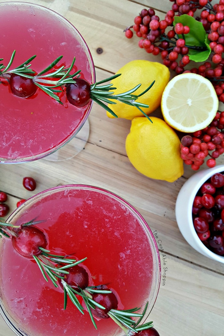 A festive cranberry twist on a lemon drop martini recipe, using a homemade cranberry syrup for a bit of sweetness. Light, fruity and festive! #martini #cranberry #lemon #cocktail