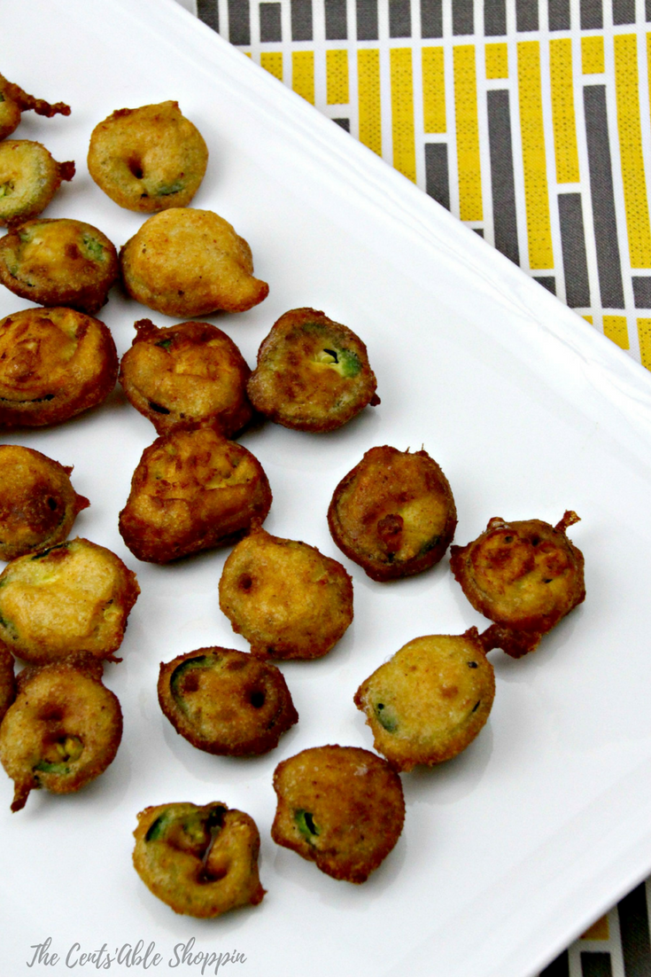 These deep fried jalapeño slices are surprisingly easy, yet sinfully addictive! Serve them up at your next party alongside melted cheese sauce. #jalapenos #appetizer #snack