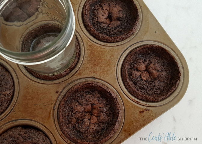 Combine strawberries with yummy cheesecake and brownies to make an adorable festive brownie cup dessert perfect for Valentine's Day! #strawberries #valentine #valentinesday #cheesecake