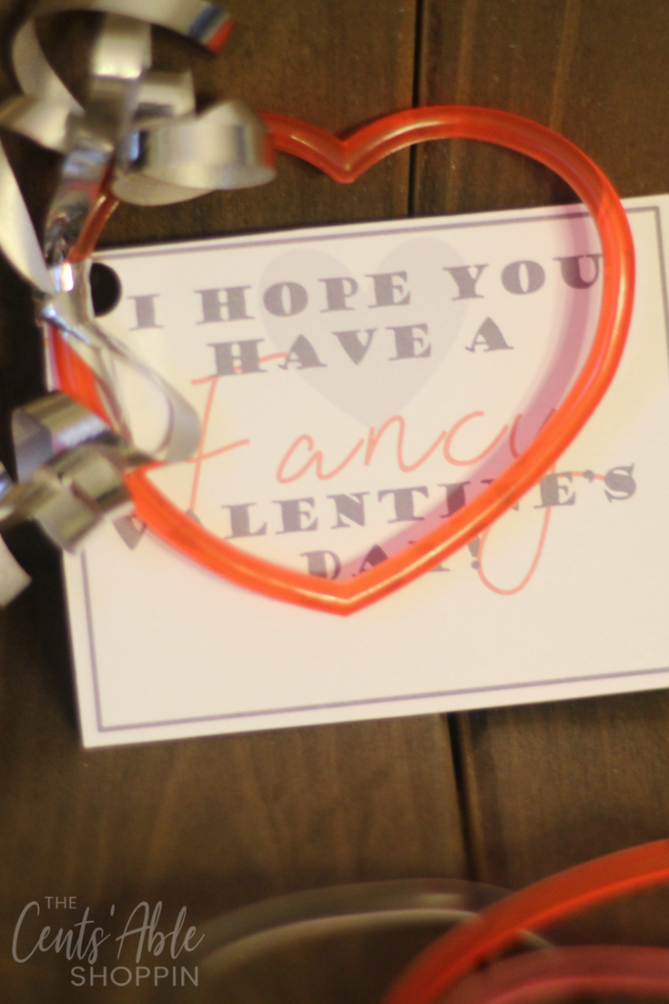 These heart bracelet Valentines are such an inexpensive, yet "fancy" Valentine's Day option for the classroom!  Get the DIY and FREE Valentine printable!    #Valentine #ValentinesDay #printable #bracelet #noncandy 