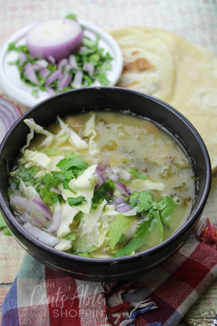 This Roasted Tomatillo and Bean soup is easy to throw together quickly for a flavorful, hearty Mexican-inspired meatless meal! #Mexican #tomatillo #meatless #soup #healthy
