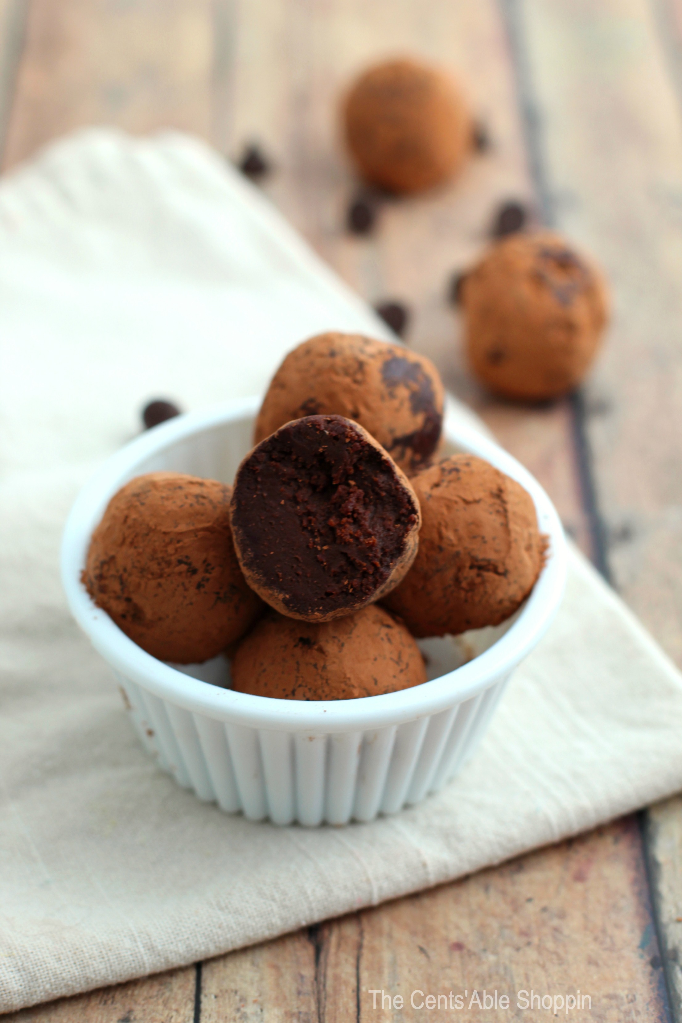 These Healthy Chocolate Fudge Truffles taste like heaven in a bite size snack! They are made quite easily with 4 simple ingredients!