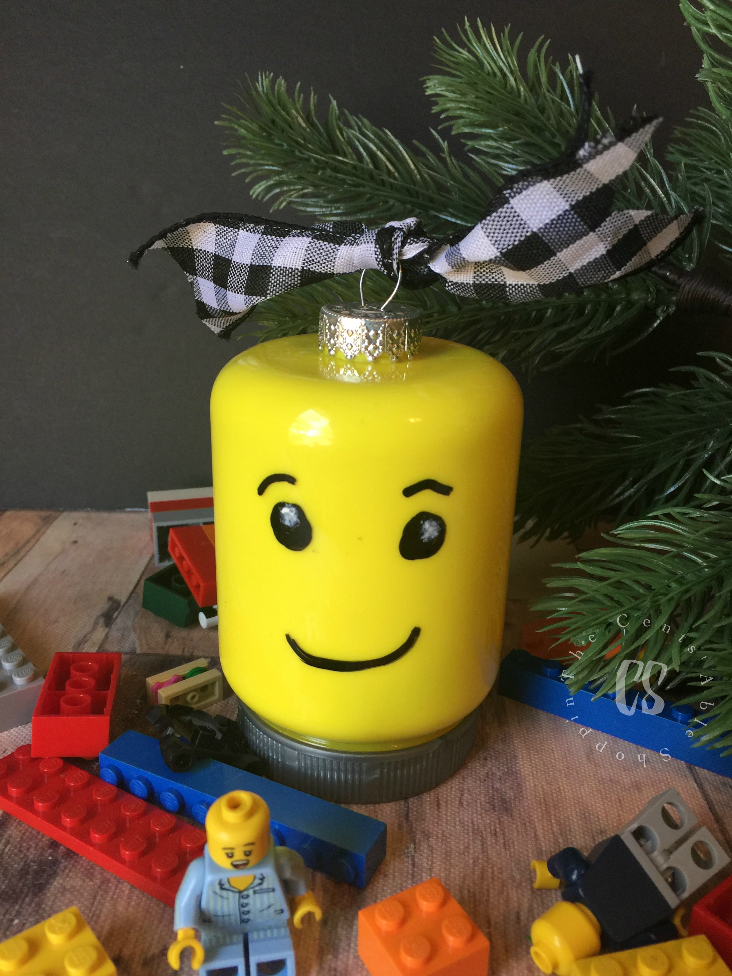 This simple LEGO Head Minifig Ornament is easy to make with simple items that would be a great project for a small family or as a larger group craft!