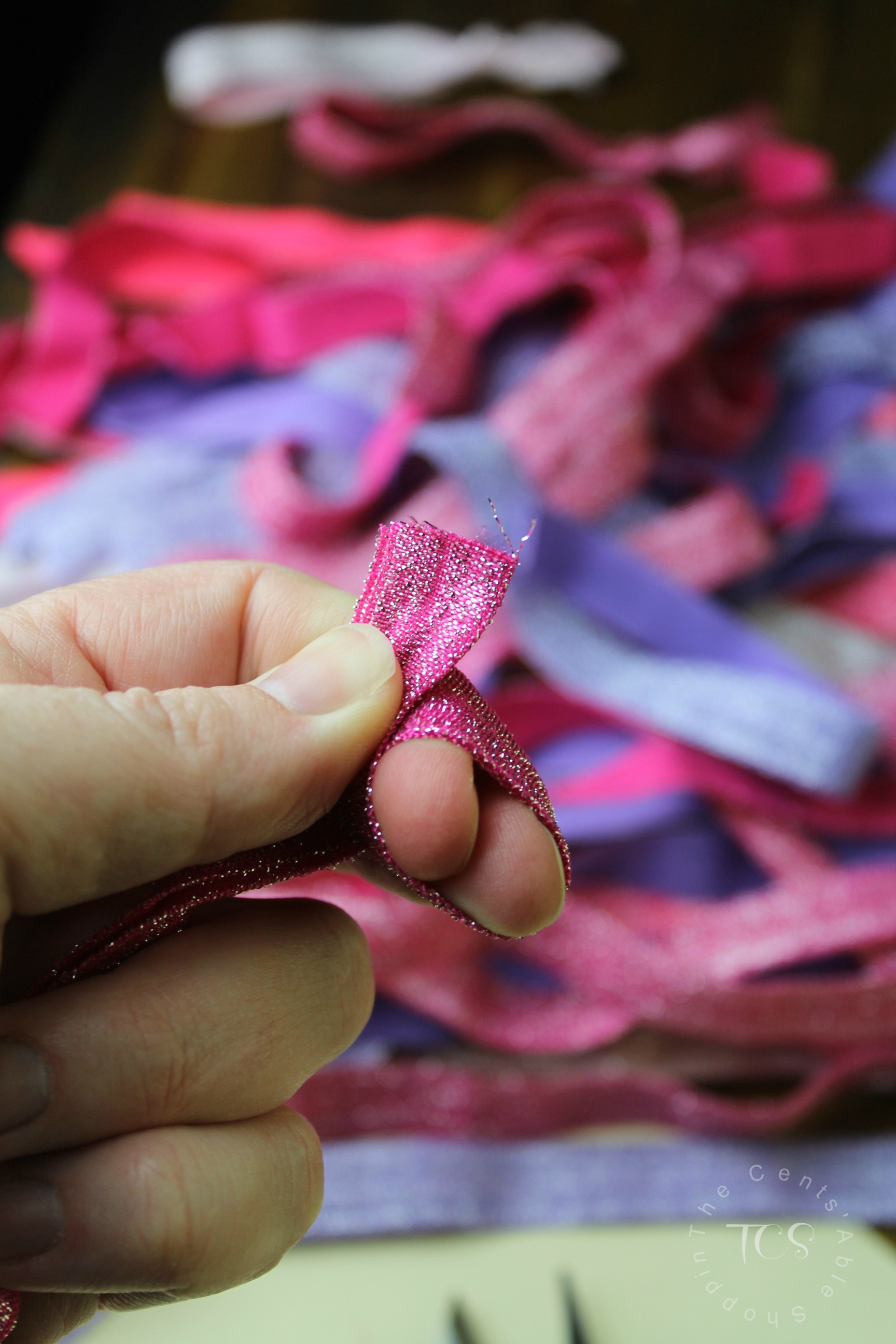 Easily make your own no-crease hair ties for literally pennies each! These ties are perfect for a girl of any age - to gift, for birthdays, and more!