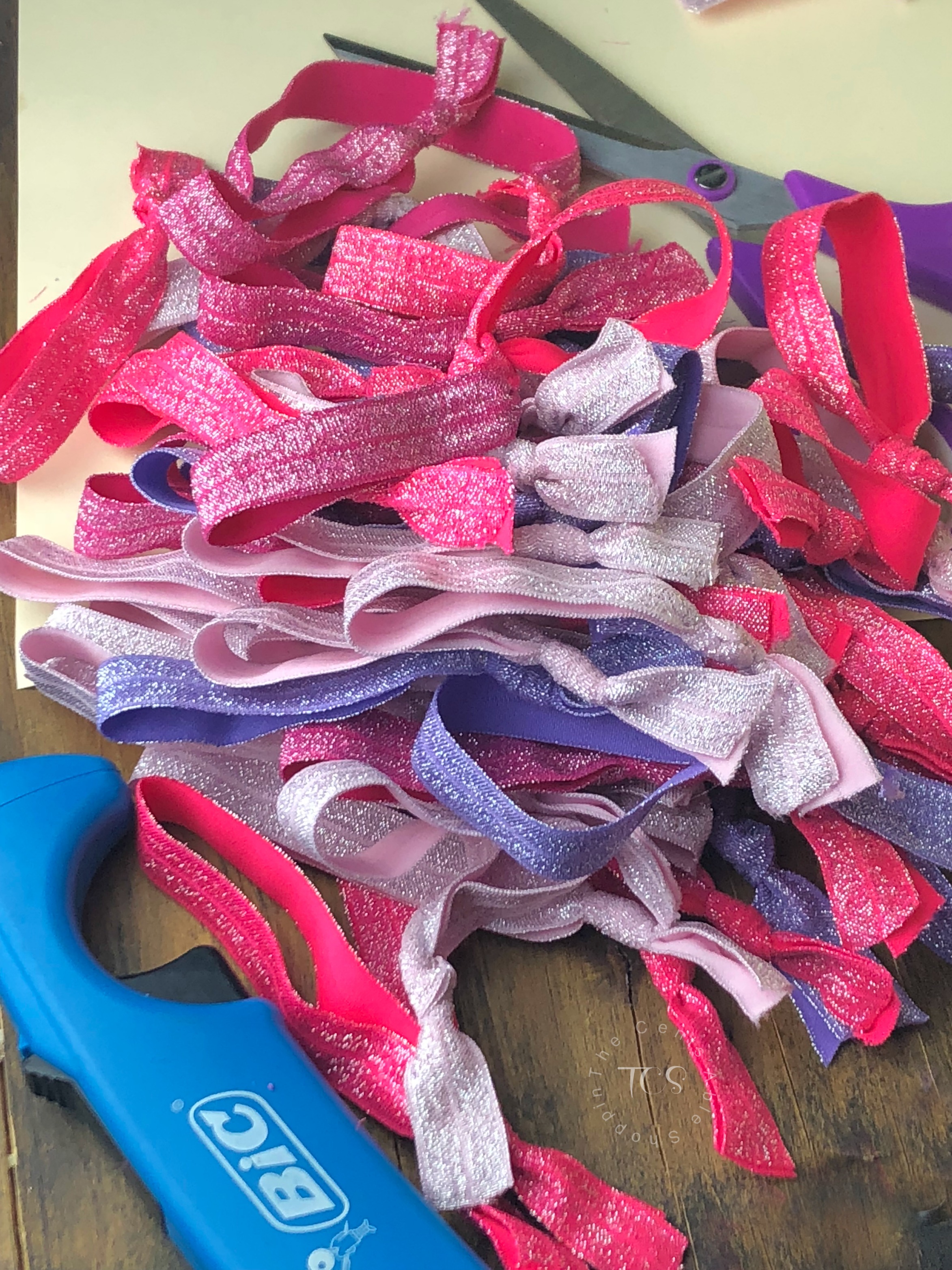 Easily make your own no-crease hair ties for literally pennies each! These ties are perfect for a girl of any age - to gift, for birthdays, and more!