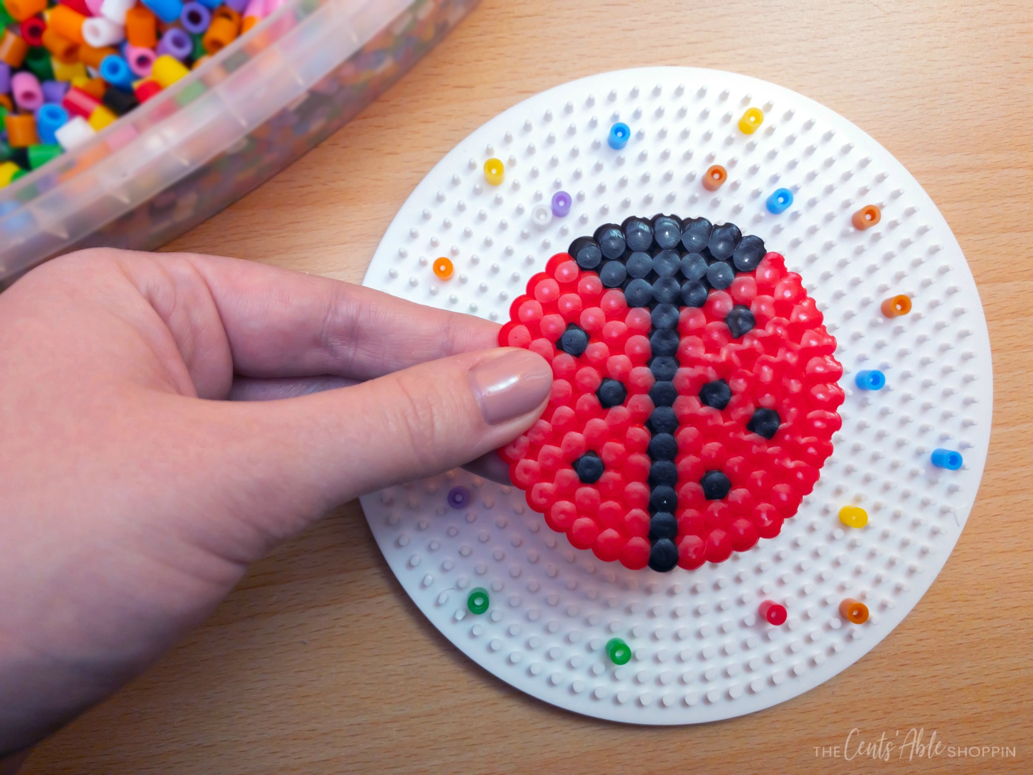 This perler bead ladybug is a fun and adorable project that will help kids develop fine motor skills, patience and artistic design!