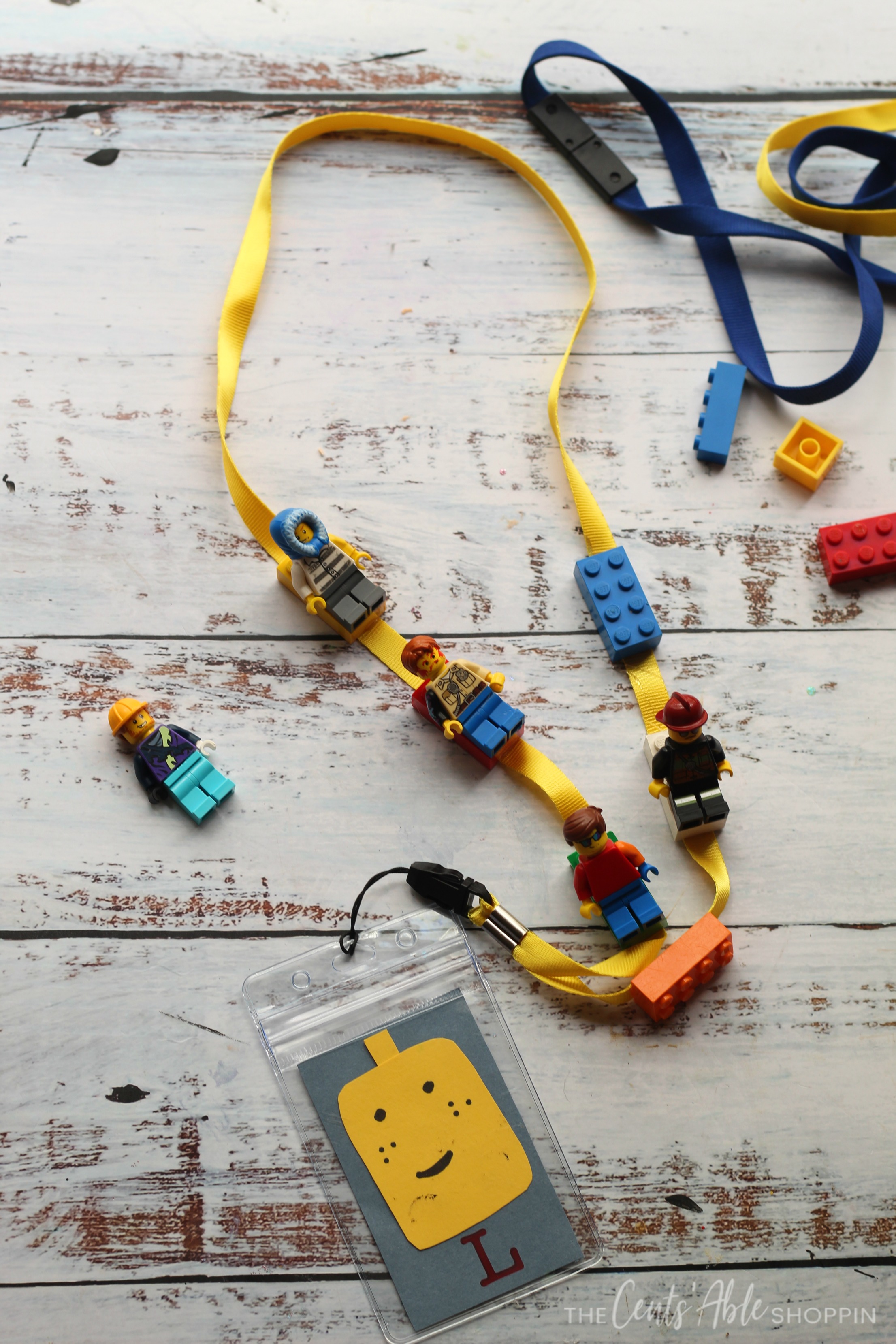 Step by step directions to create a simple DIY LEGO Lanyard, perfect for trading LEGO Minifigs on your next fun trip to LEGOLAND!  #LEGO #lanyard #DIY  #LEGOLAND
