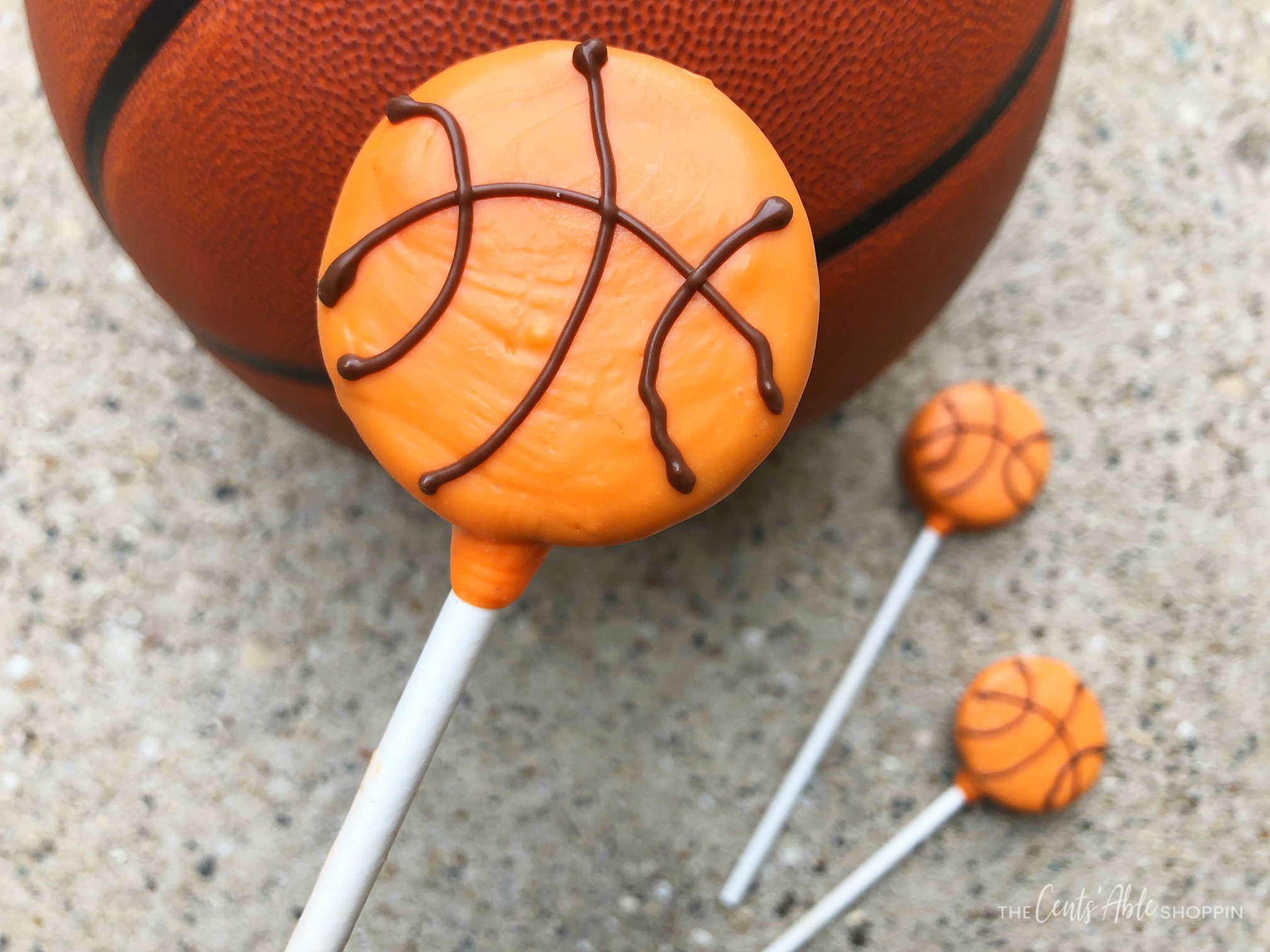 Yummy Basketball Oreo Pops - the perfect way to celebrate a successful season or a delicious treat to serve at game time!