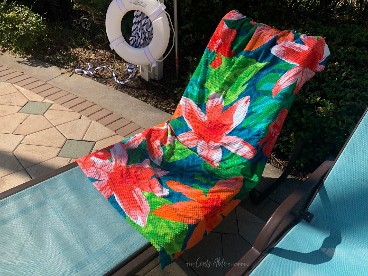 This simple beach towel DIY takes just minutes and will prevent your towel from slipping off your chair when relaxing around the pool or beach this summer!