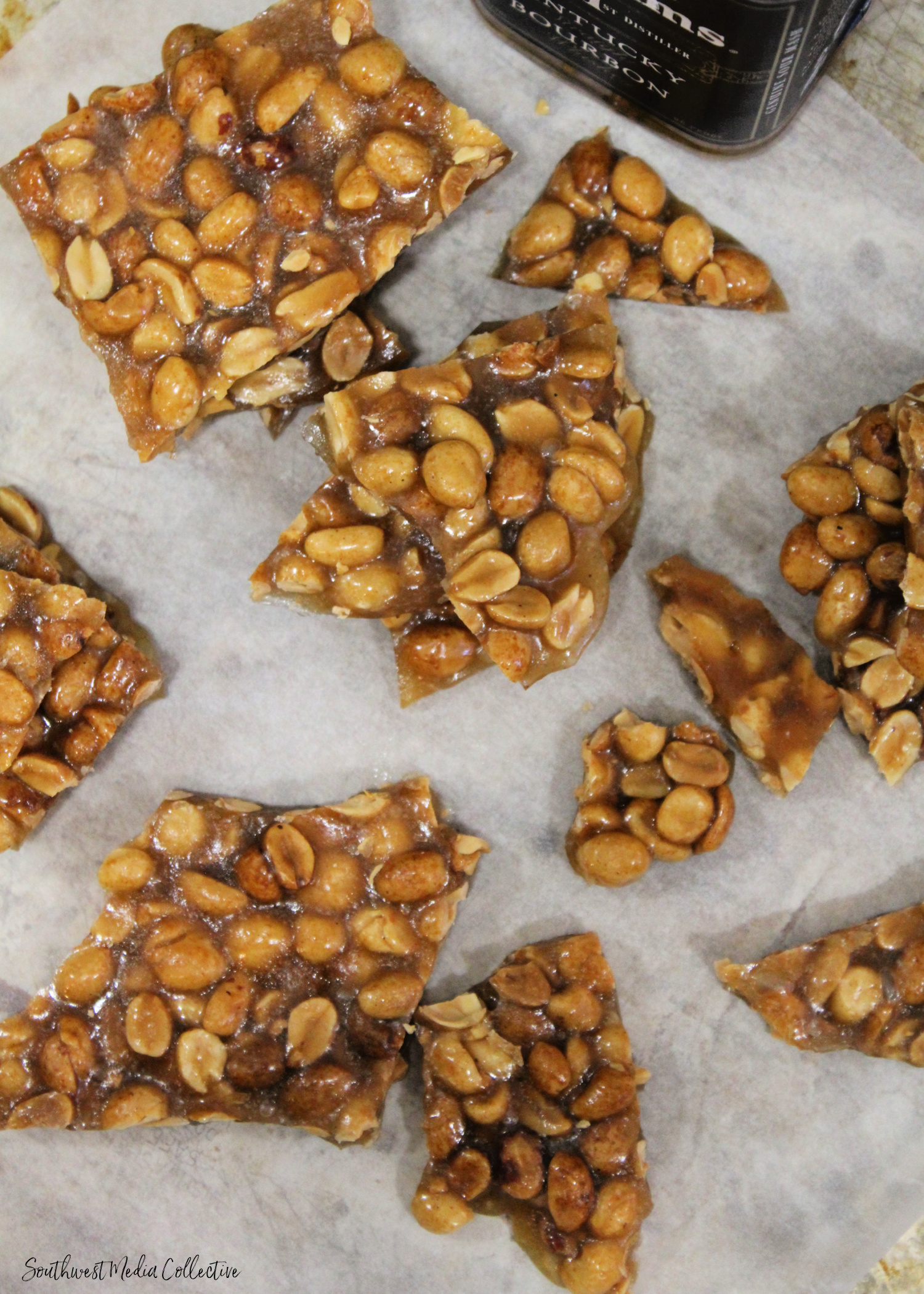 This Bourbon Peanut Brittle is a combination of salty and sweet and a perfect snack to make at the holidays for a party tray that's sure to please!