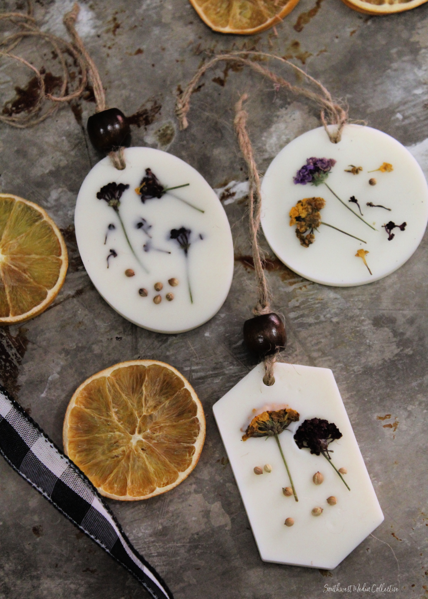 Learn how to make these beautiful Scented Botanical Wax Ornaments - they are an inexpensive way to decorate for the holidays, created with candle wax, botanicals and scent. 