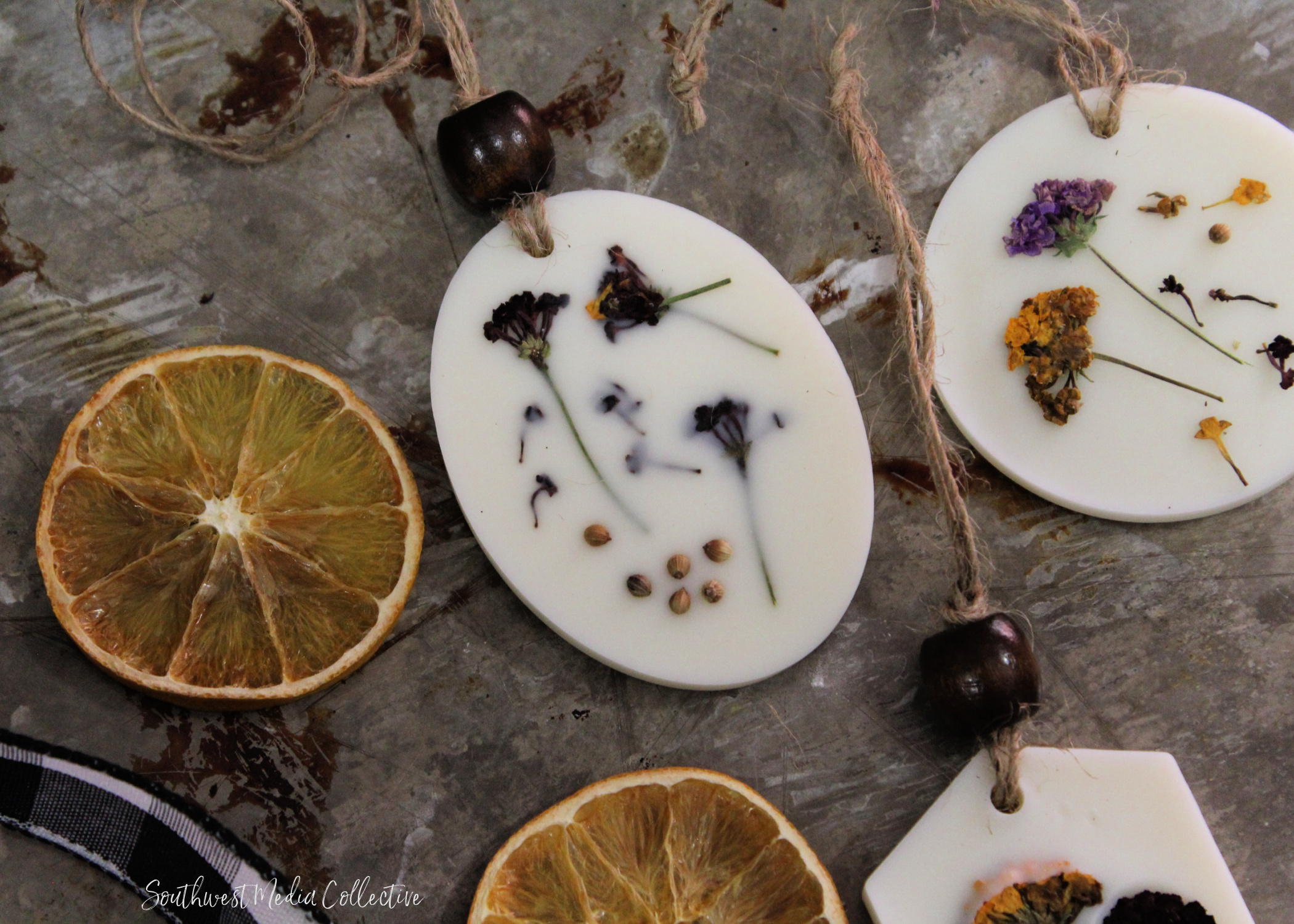 Learn how to make these beautiful Scented Botanical Wax Ornaments - they are an inexpensive way to decorate for the holidays, created with candle wax, botanicals and scent. 