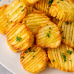 Delicious and easy, these Air Fryer Accordion Potatoes come together in less than 30 minutes with just 3 basic ingredients!