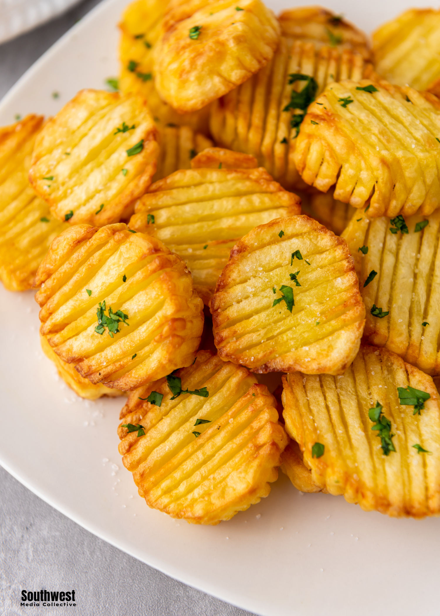 Delicious and easy, these Air Fryer Accordion Potatoes come together in less than 30 minutes with just 3 basic ingredients!