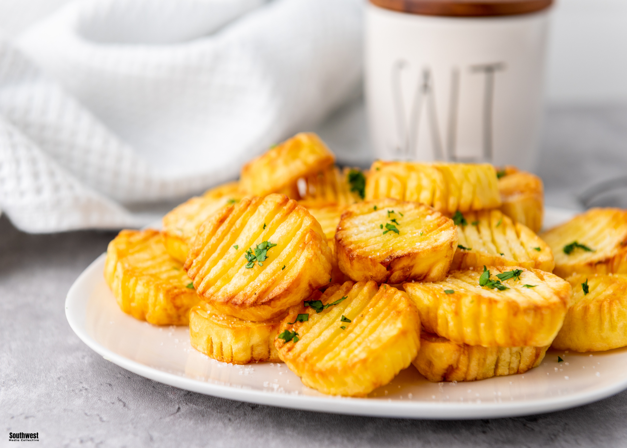 Delicious and easy, these Air Fryer Accordion Potatoes come together in less than 30 minutes with just 3 basic ingredients!