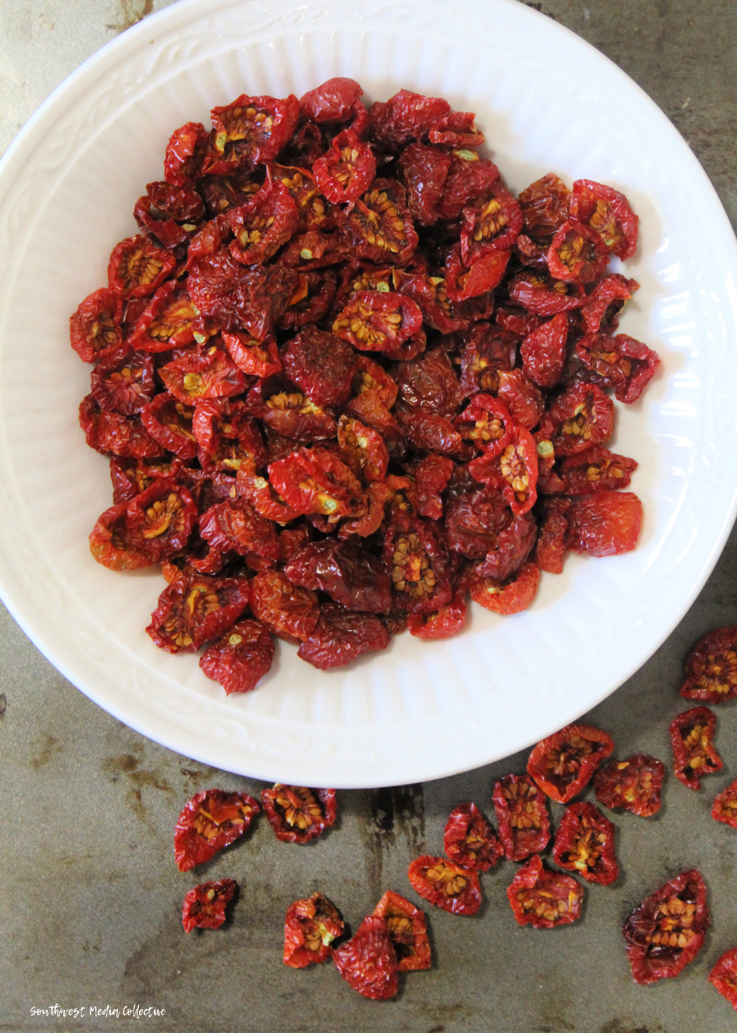 Step by step directions to help you dehydrate cherry tomatoes - the result is a tasty, burst of flavor that can be used in salads, wraps, bread and more!